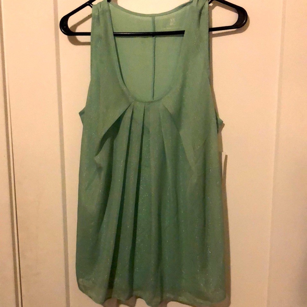 Green sparkly summer top that’s never been worn.